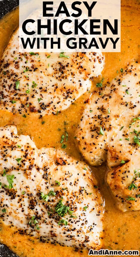 Chicken with gravy in a pan.