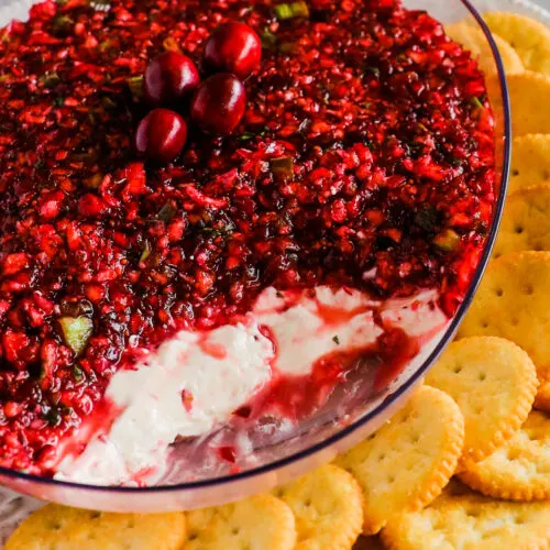 Cranberry jalapeno dip with cream cheese bottom layer crackers.