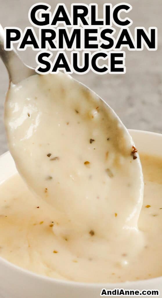 spoon pouring garlic parmesan sauce into bowl