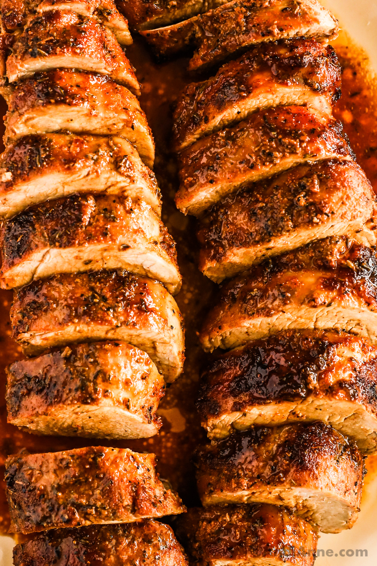 Close up of juicy sliced pork tenderloin