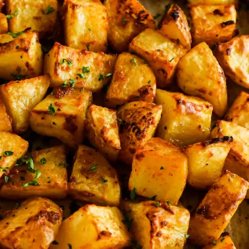 Roasted potatoes on baking sheet.