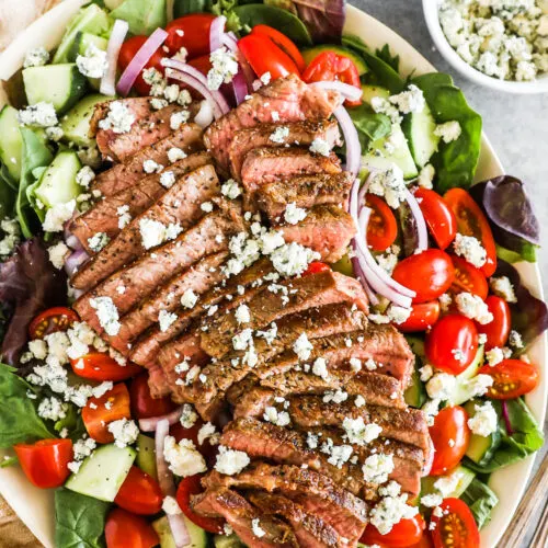 Steak salad on a plate.