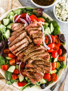 Steak salad on a plate.