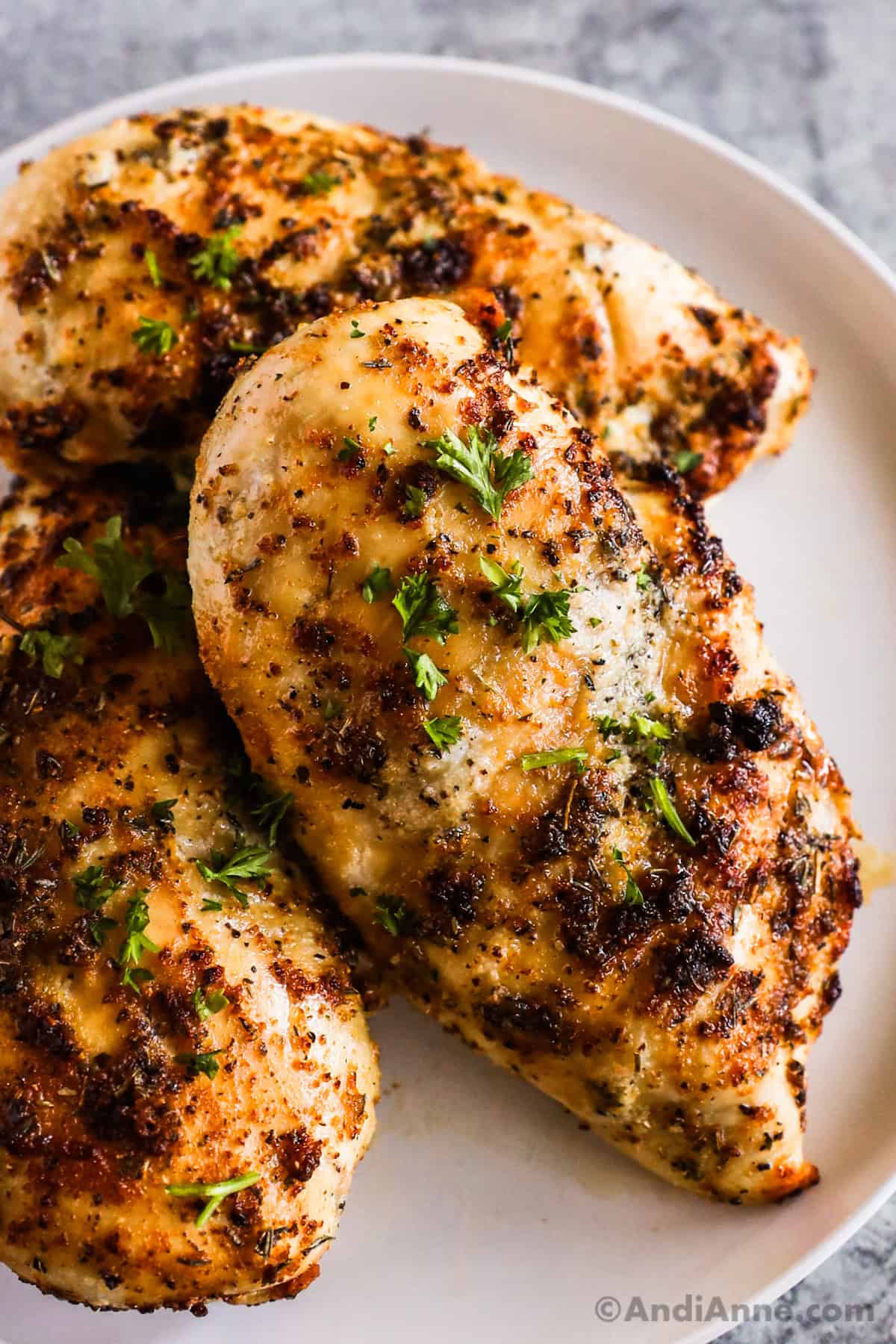 Close up of cooked chicken breasts.