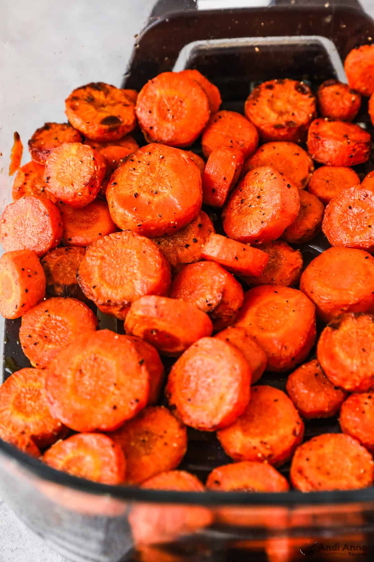 close up of chopped carrots in an air fryer