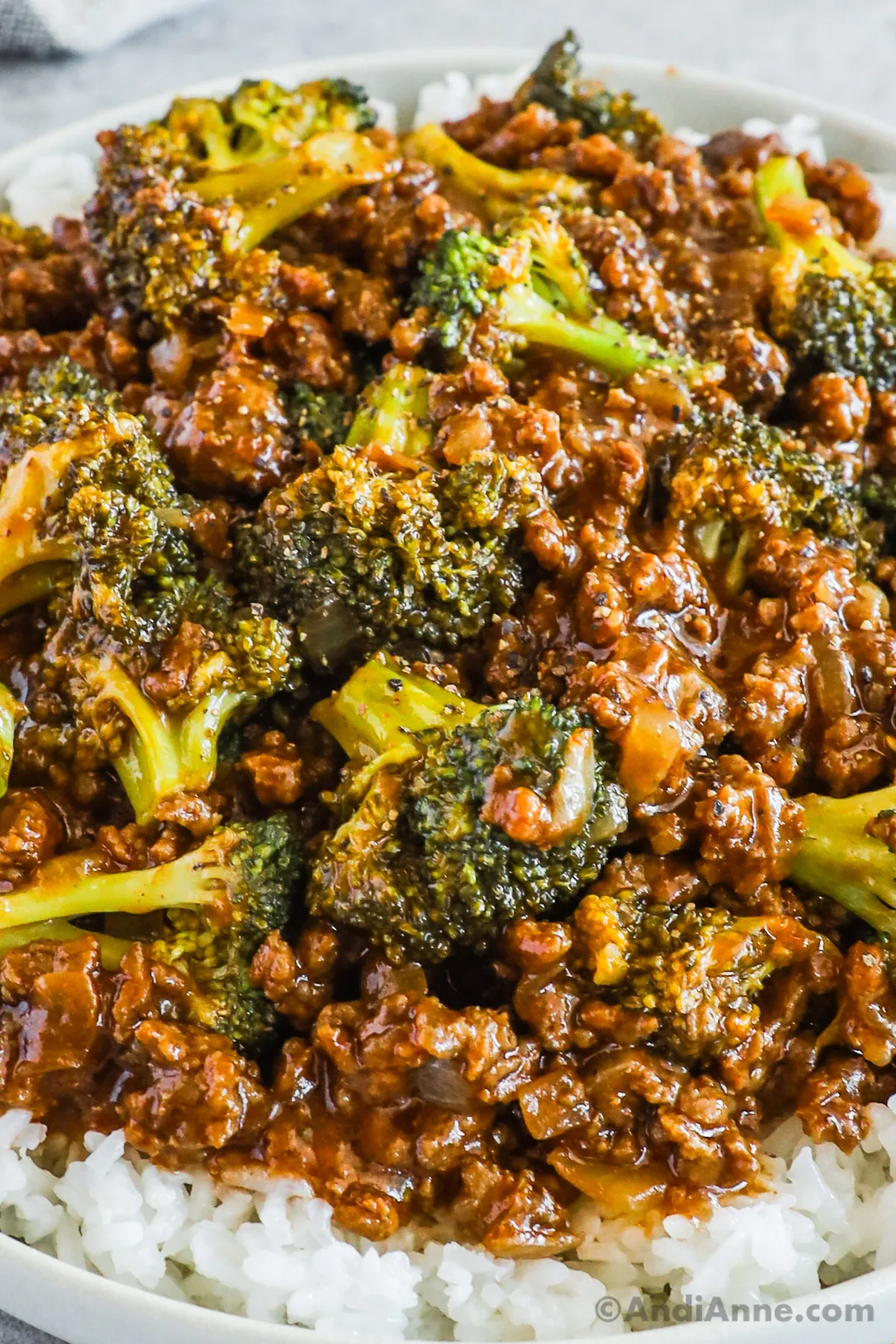 Close up of broccoli and ground beef in a honey garlic sauce.
