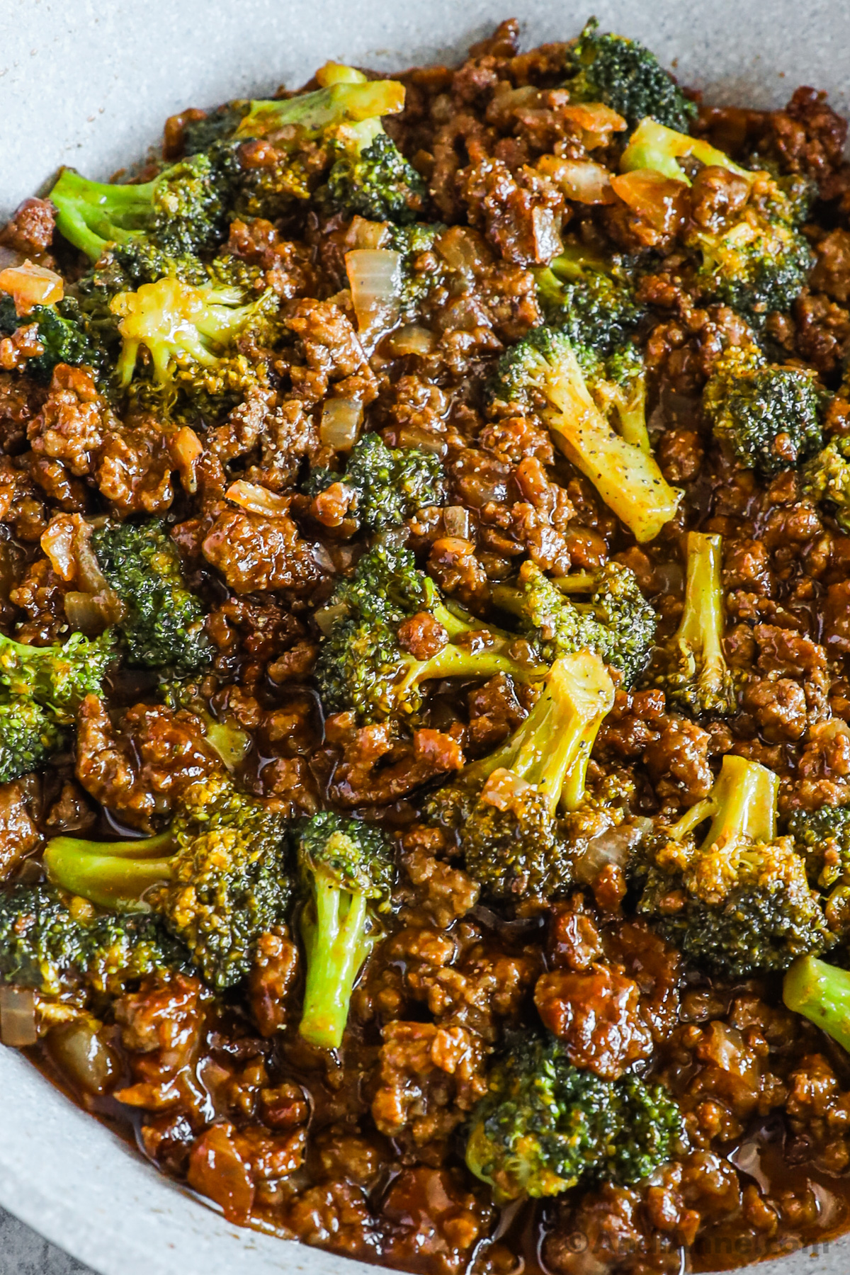 Close up of ground beef with broccoli in a honey garlic sauce.