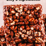 Easy puffed wheat squares with only 6 ingredients that are stacked on top of eachother