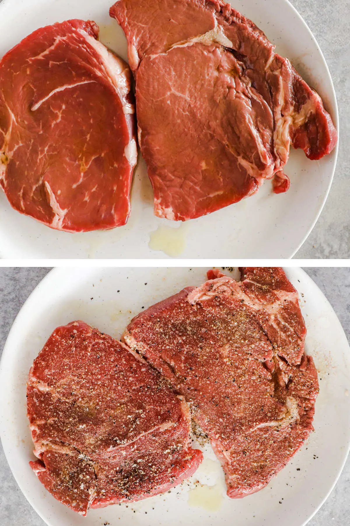 Two raw steaks, drizzled with olive oil and seasoned with salt and pepepr