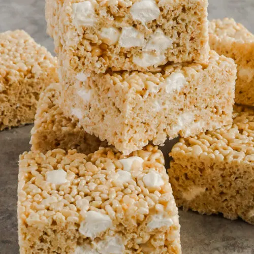 A stack of rice krispie treats with marshmallows mixed in them