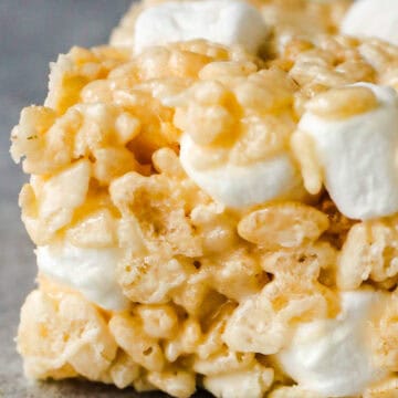 Close up of a rice krispie square with extra marshmallows
