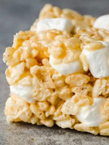 Close up of a rice krispie square with extra marshmallows