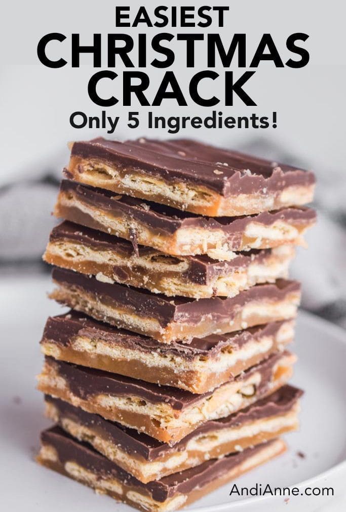 Pile of Christmas crack saltine toffee bark on a plate, showing the crunchy crackers, golden toffee, and smooth melted chocolate.