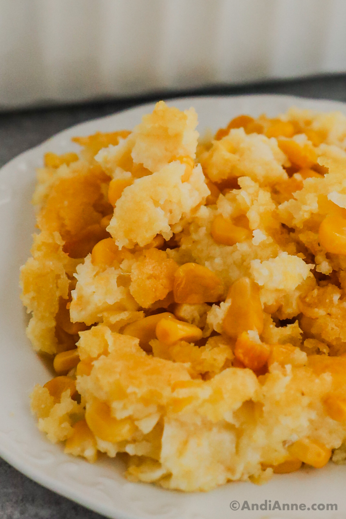 Close up of a serving of jiffy corn casserole