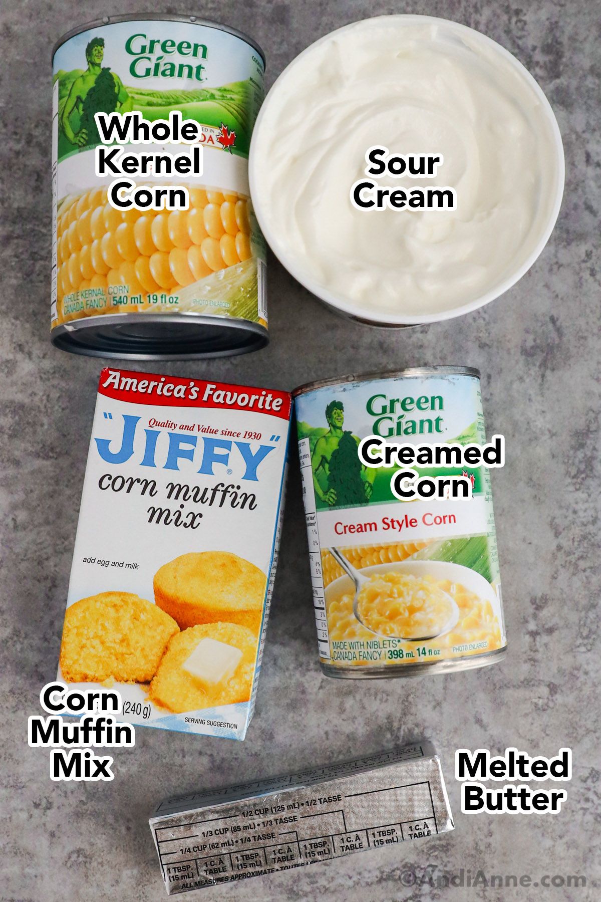 Recipe ingredients including canned kernel corn, sour cream, box of jiffy corn muffin mix, and canned cream corn