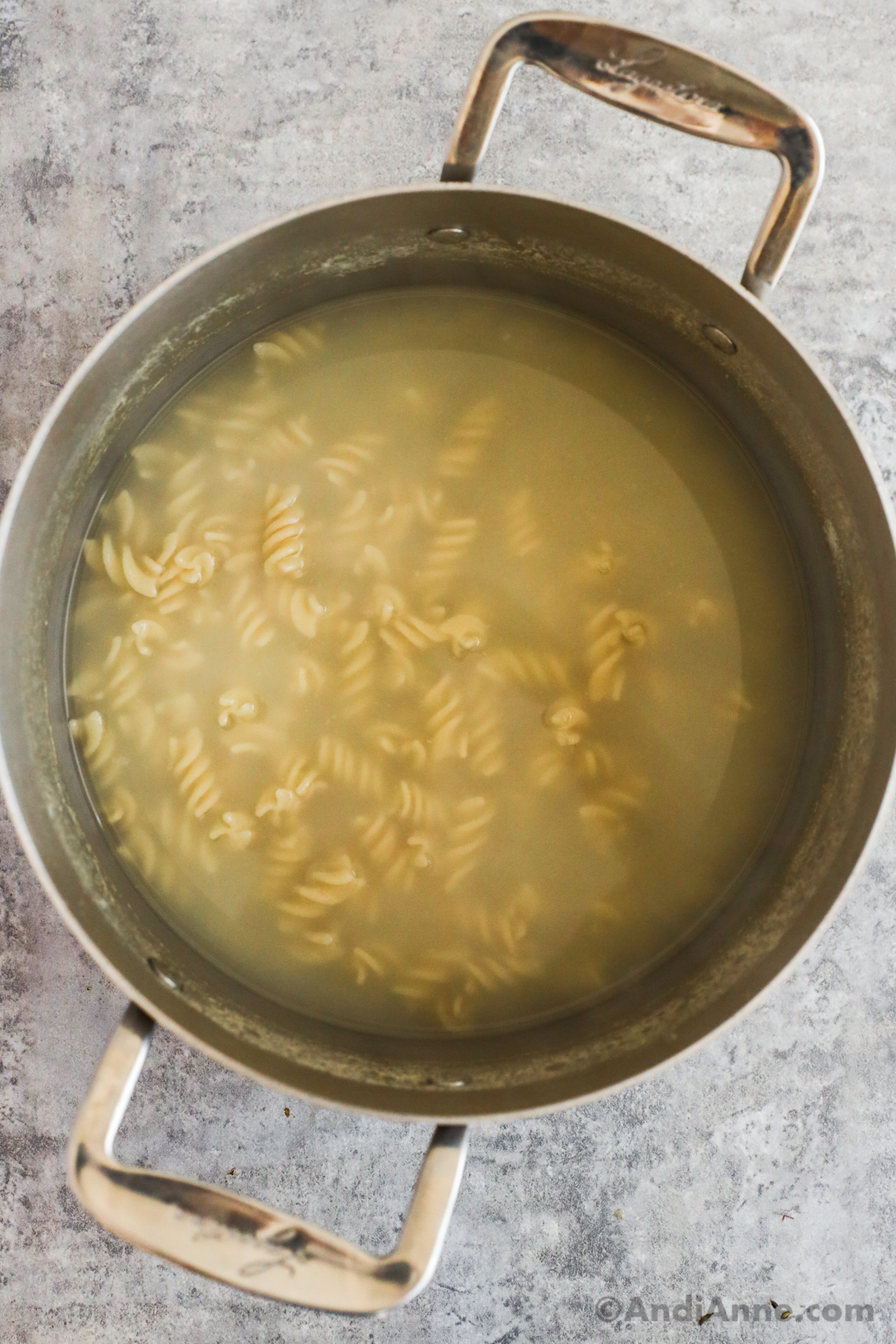 pot with water and rotini pasta 