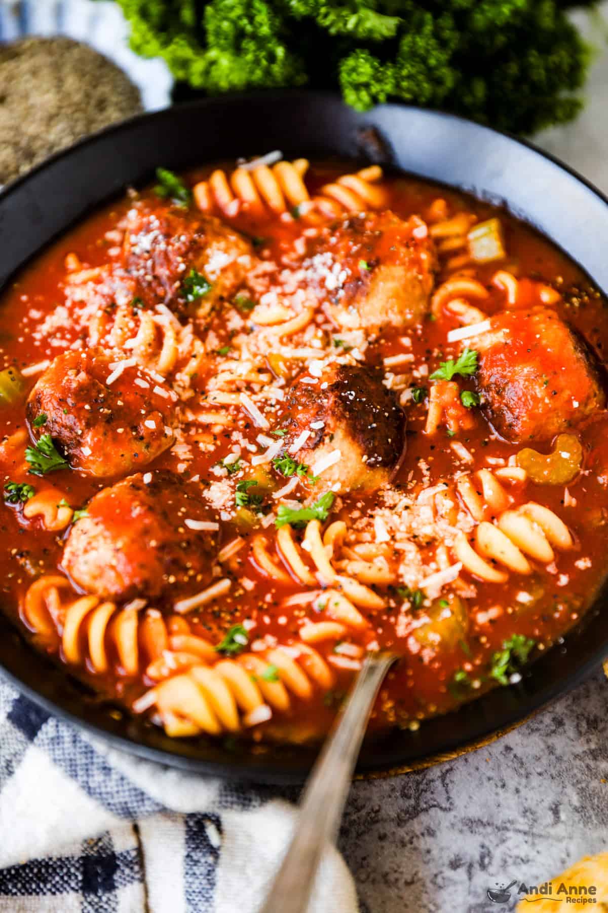 Close up of pasta and meatballs in italian meatball soup