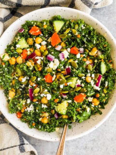 A bowl of kale chickpea salad