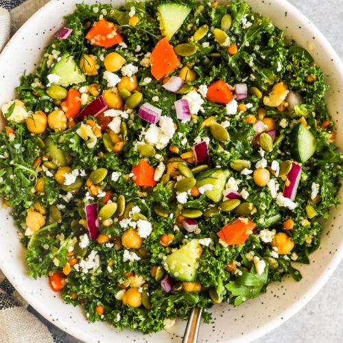 A bowl of kale chickpea salad