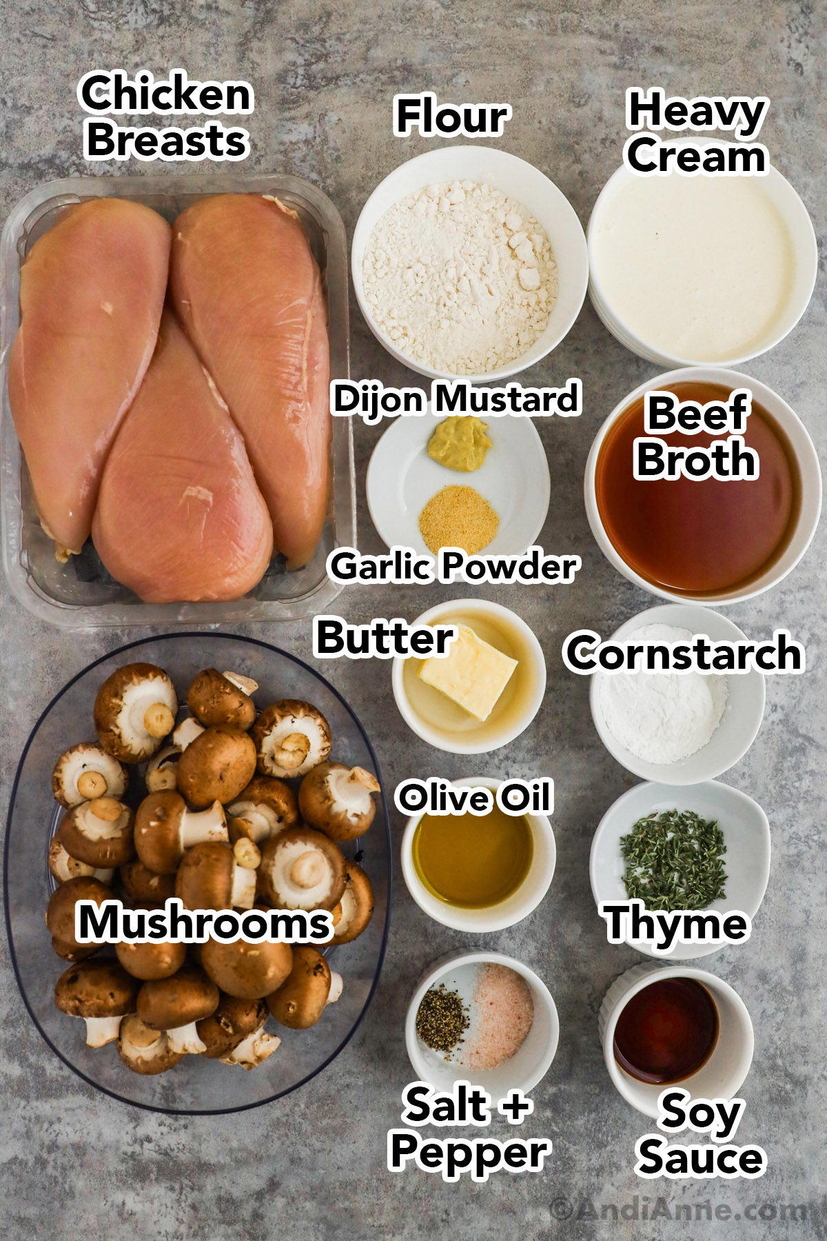 Recipe ingredients including raw chicken breast, bowls of flour, milk, broth, cornstarch, mushrooms, oil, butter and thyme