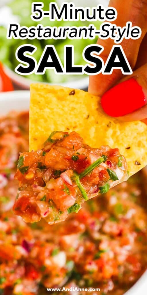 Close up of a tortilla chip with 5 minute restaurant style salsa recipe