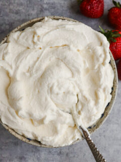 A bowl of fluffy homemade whipped cream