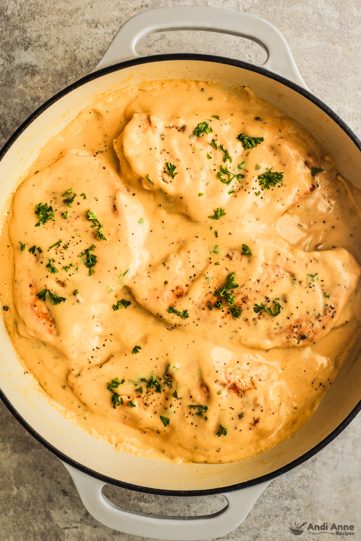 Close up of creamy ranch chicken breasts in a pan