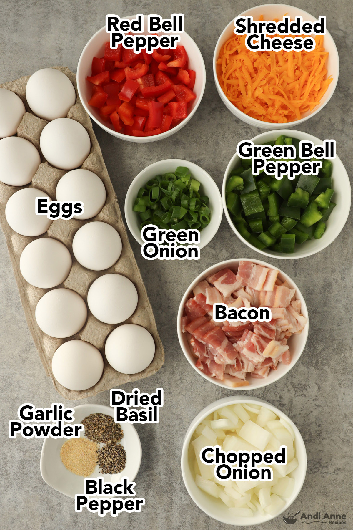 Recipe ingredients including bowls of chopped bell pepper, shredded cheese, chopped raw bacon, green onion, egg carton and spices.