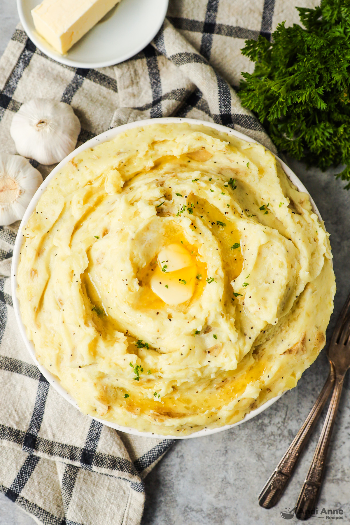 A bowl of creamy garlic mashed potatoes