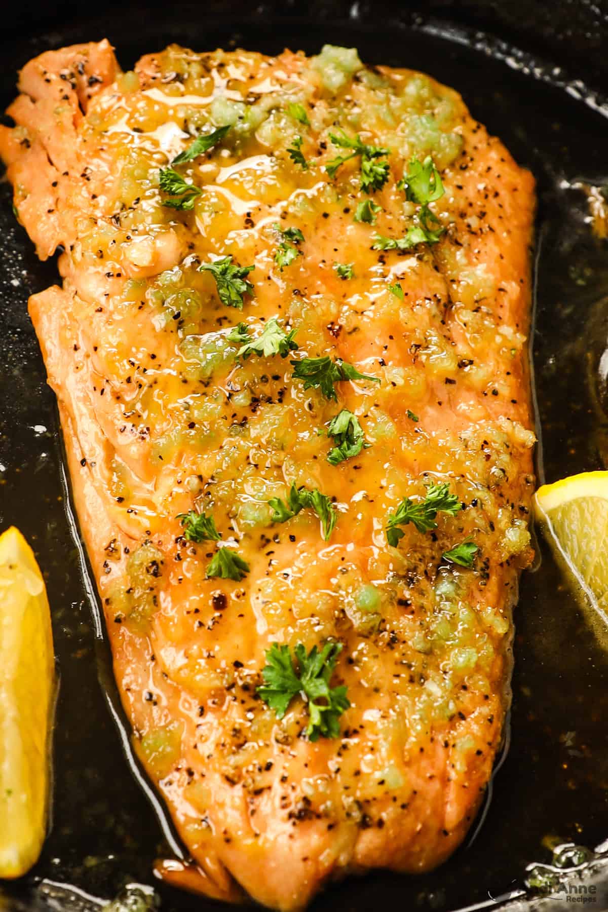 Close up of a cooked salmon fillet in a honey garlic sauce