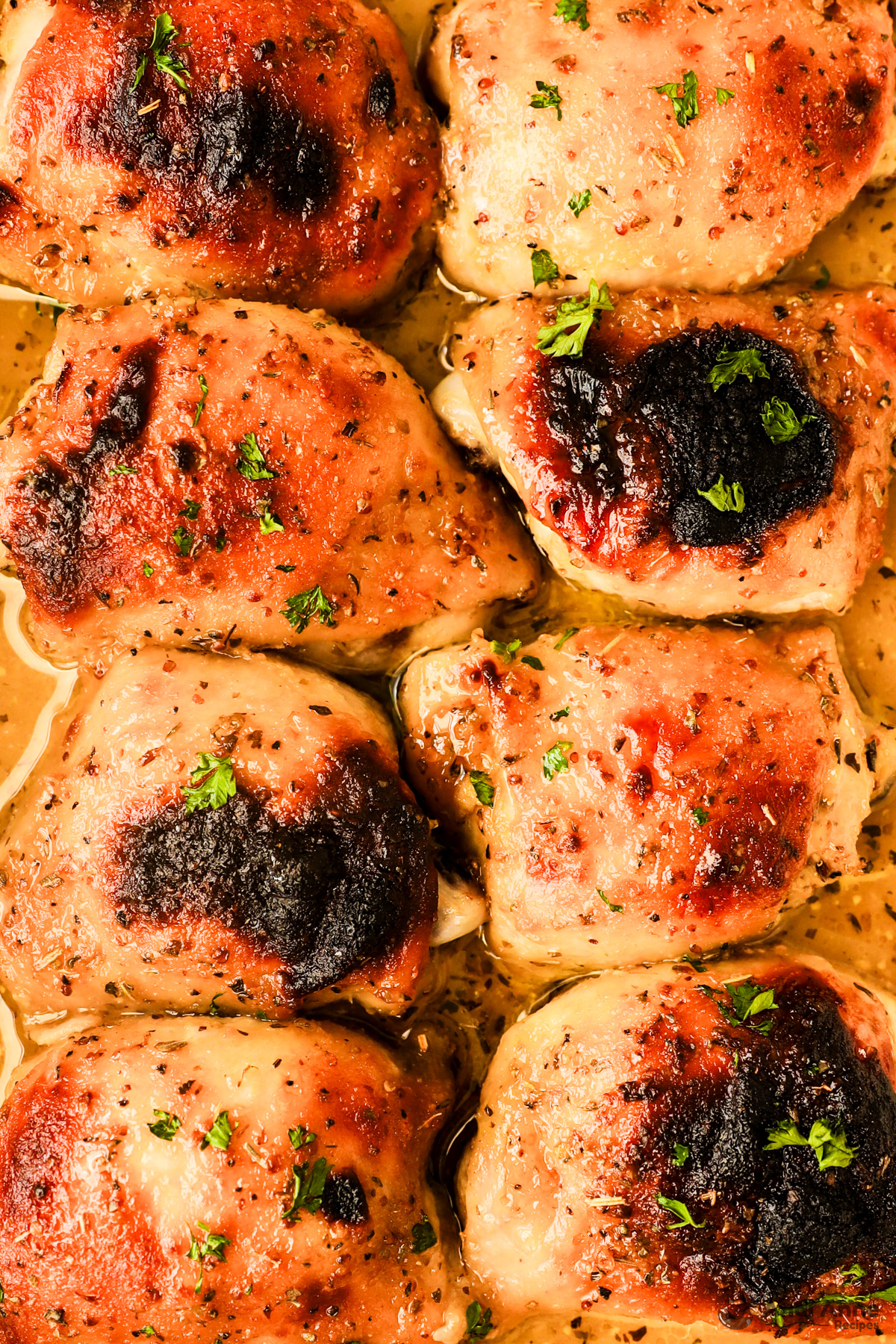 Close up of cooked honey mustard chicken thighs.