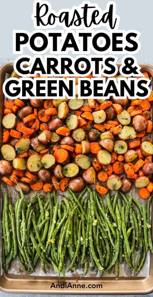 Baking sheet with roasted potatoes carrots and green beans