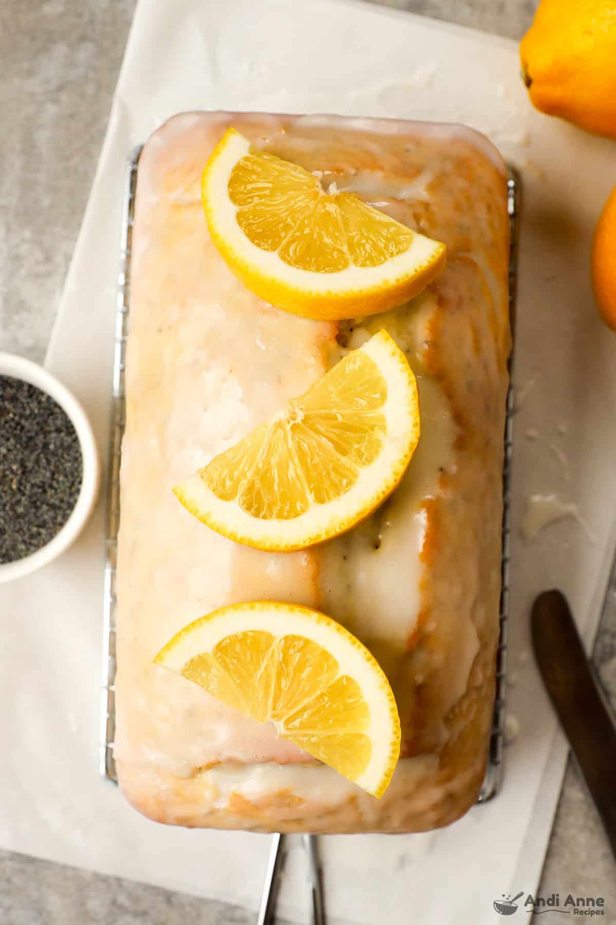 lemon pound cake with slices of lemon on top