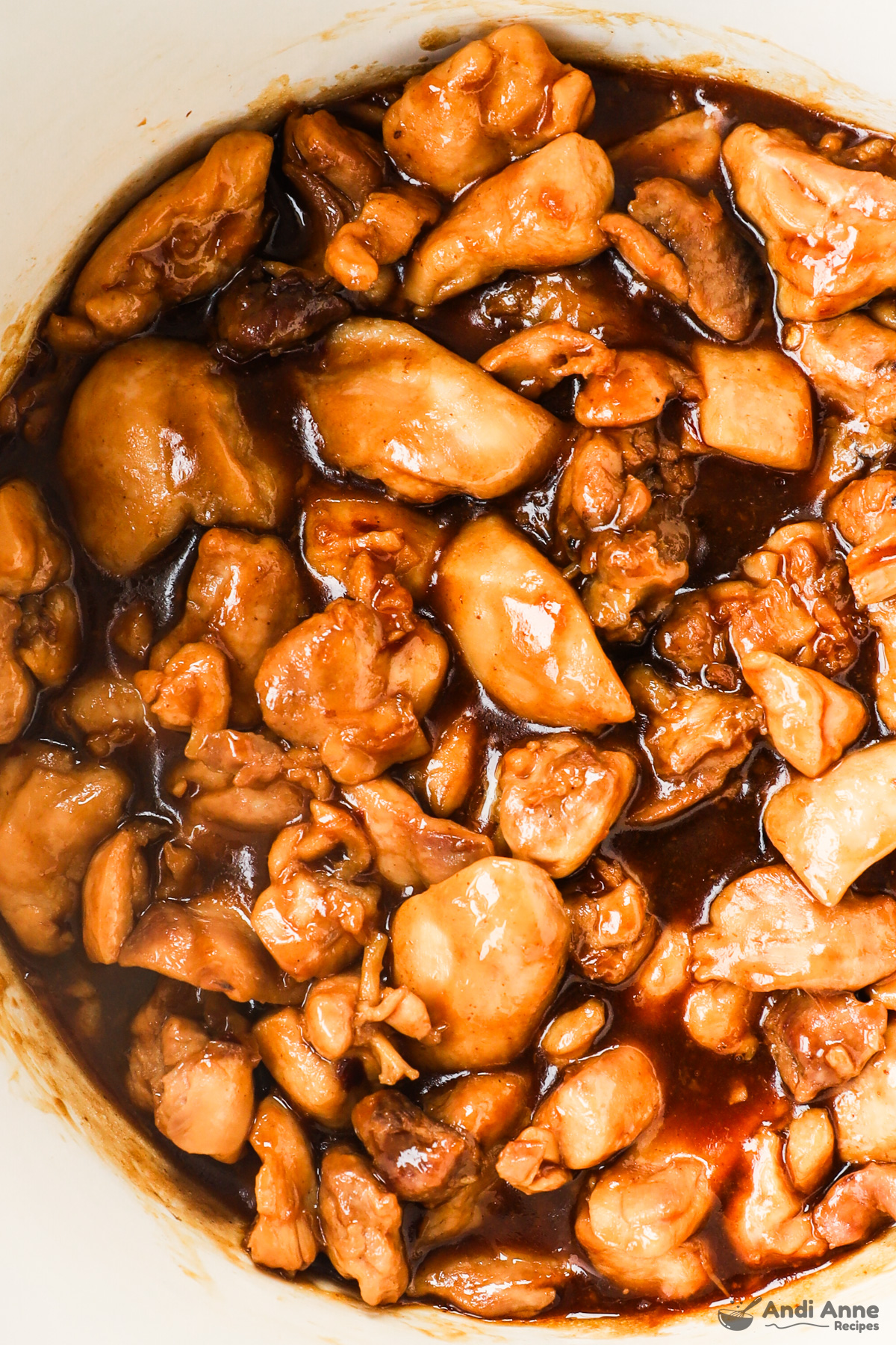 Close up of chunks of chicken in teriyaki sauce