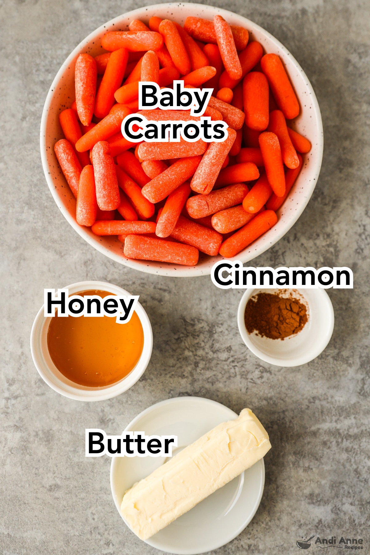 Recipe ingredients in bowls including carrots, honey, cinnamon, and butter.