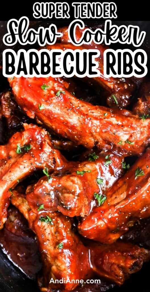 Close up of tender slow cooker barbecue ribs in a black slow cooker pot