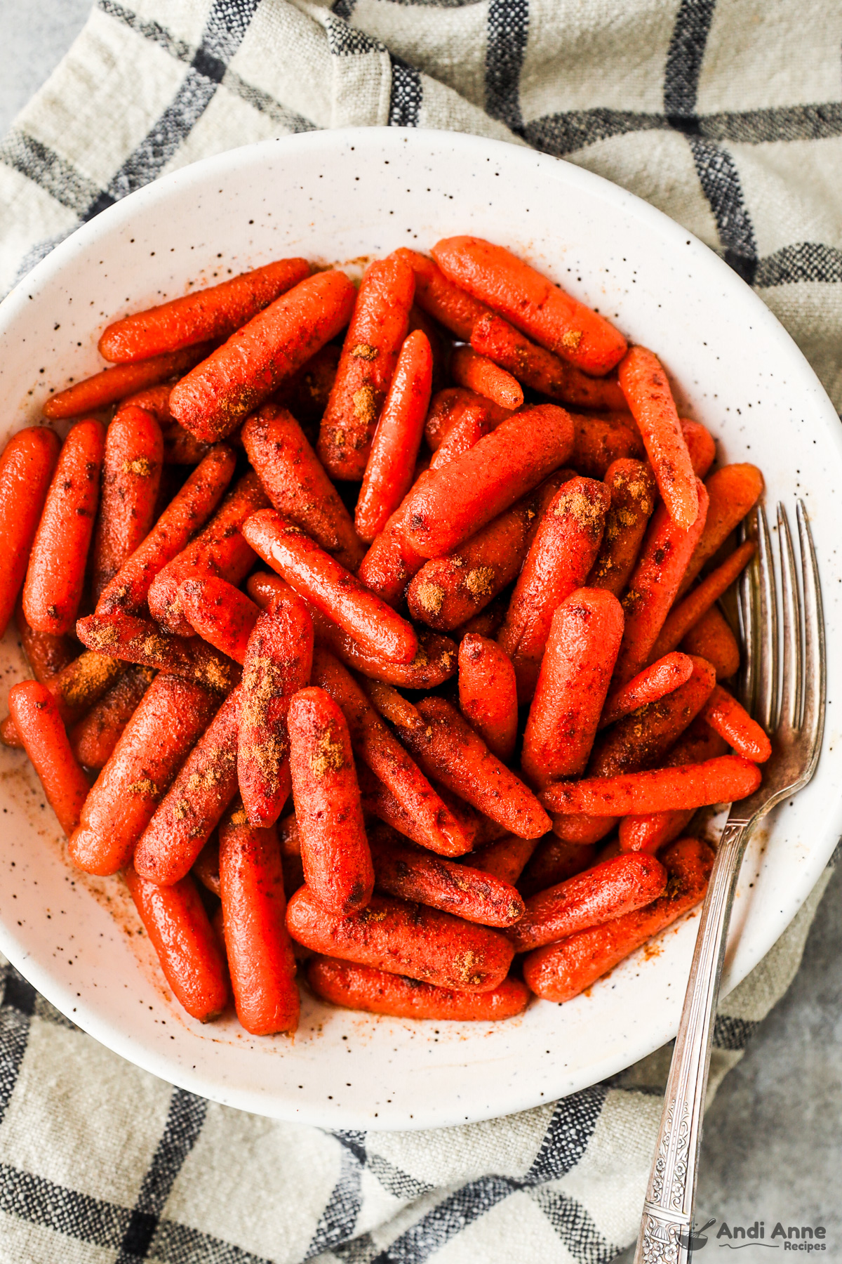 A bowl of baked cinnamon honey baby carrots