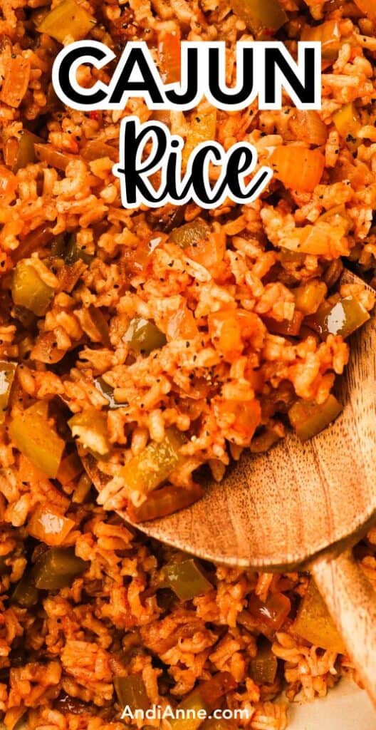 close up of cajun rice and wood spoon