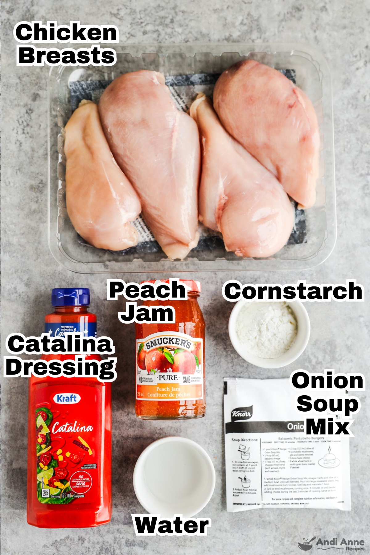 Recipe ingredients including raw chicken breasts, catalina dressing, jar of peach jam, packet of onion soup mix, small bowl with cornstarch and small bowl with water