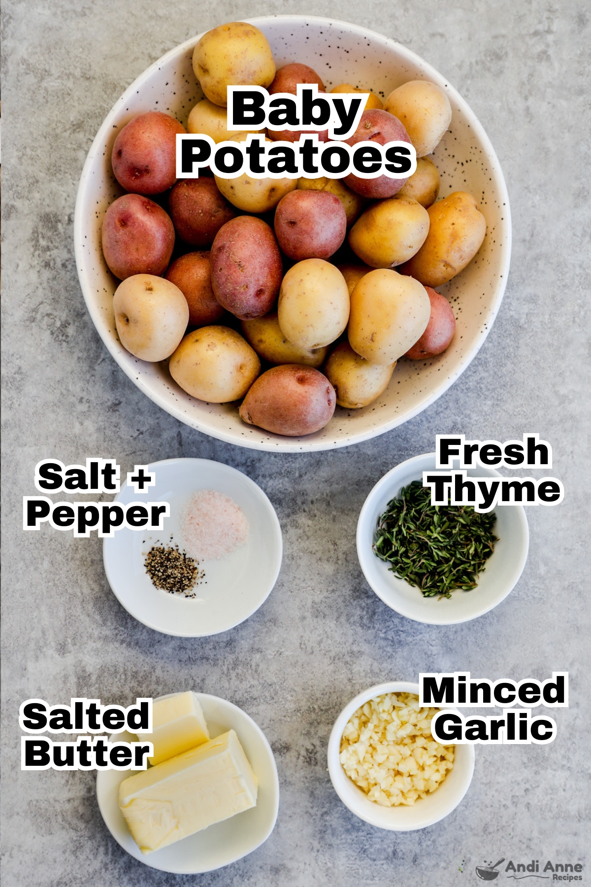 Recipe ingredients including bowls of baby potatoes, salt and pepper, fresh thyme, minced garlic, and salted butter.