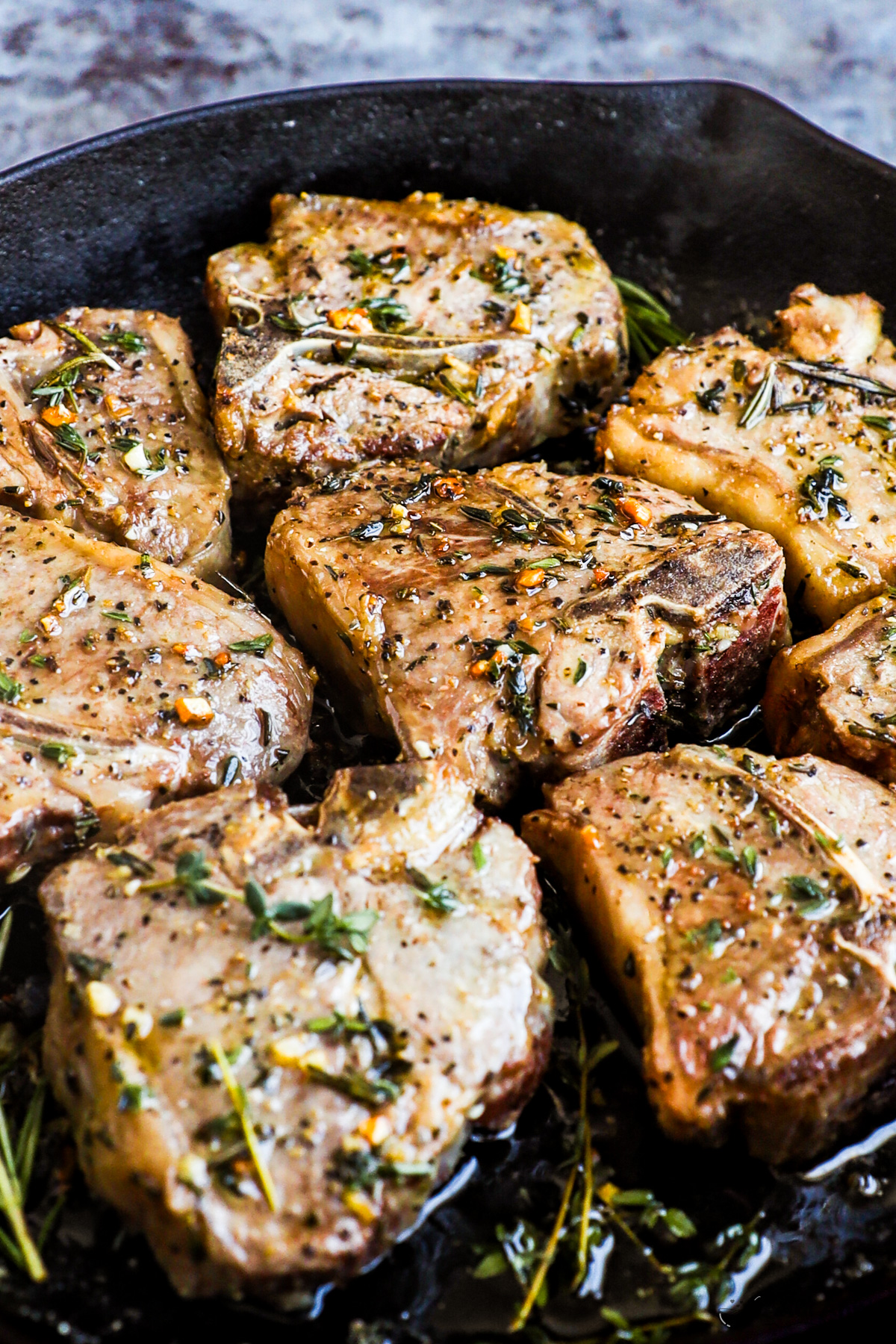 Skillet of cooked lamb chops