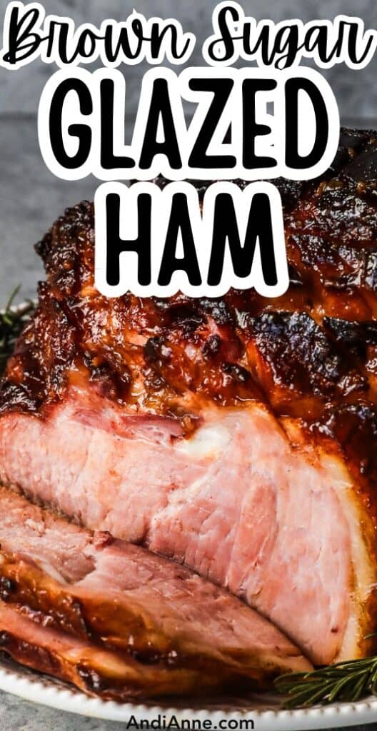 brown sugar glazed ham with some slices cut out