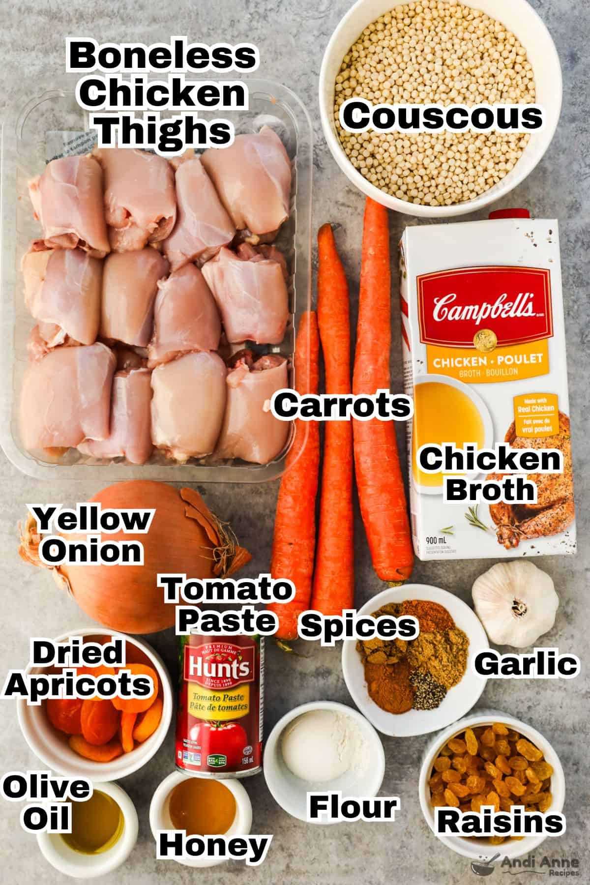Recipe ingredients including chicken thighs, couscous, carrots, chicken broth, yellow onion, tomato paste, spices, dried apricots, raisins and honey