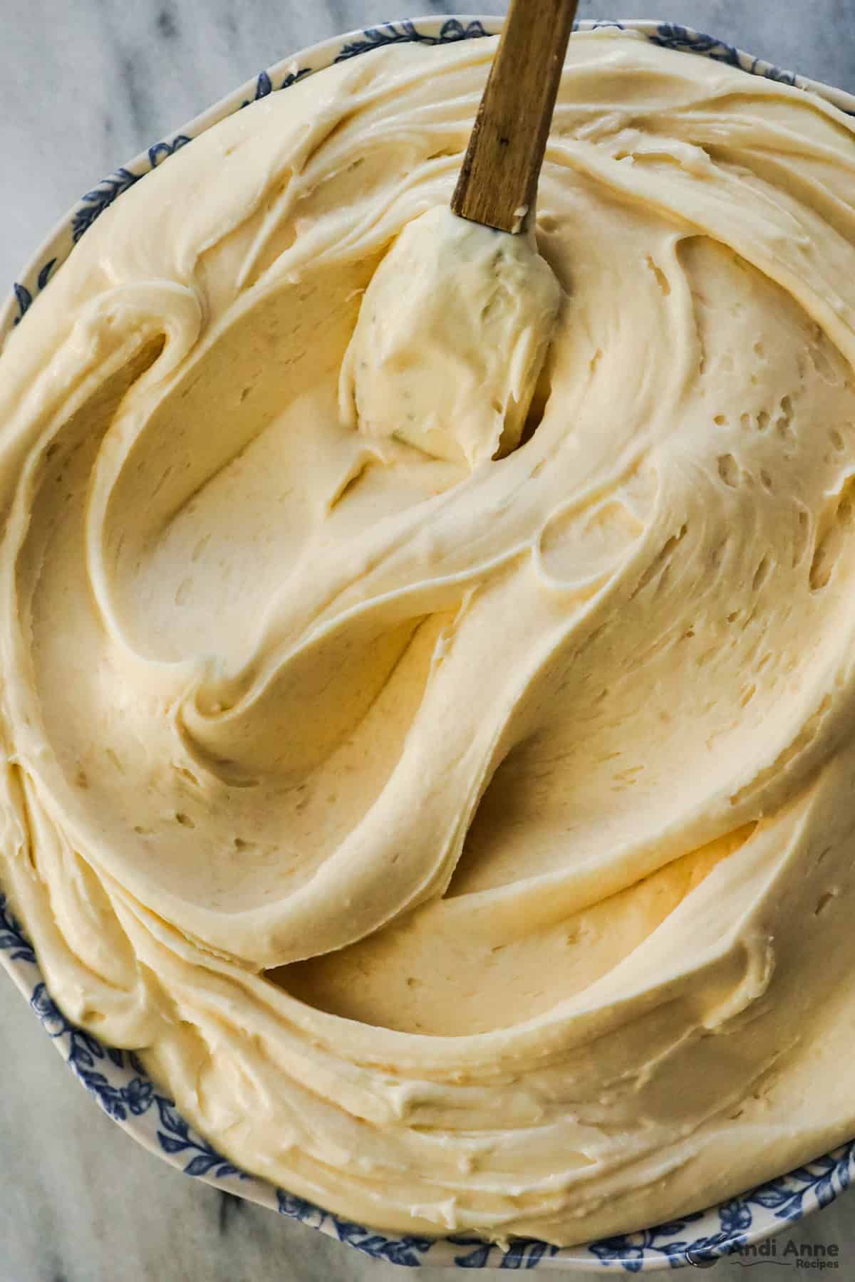 Close up of cream cheese frosting in a bowl