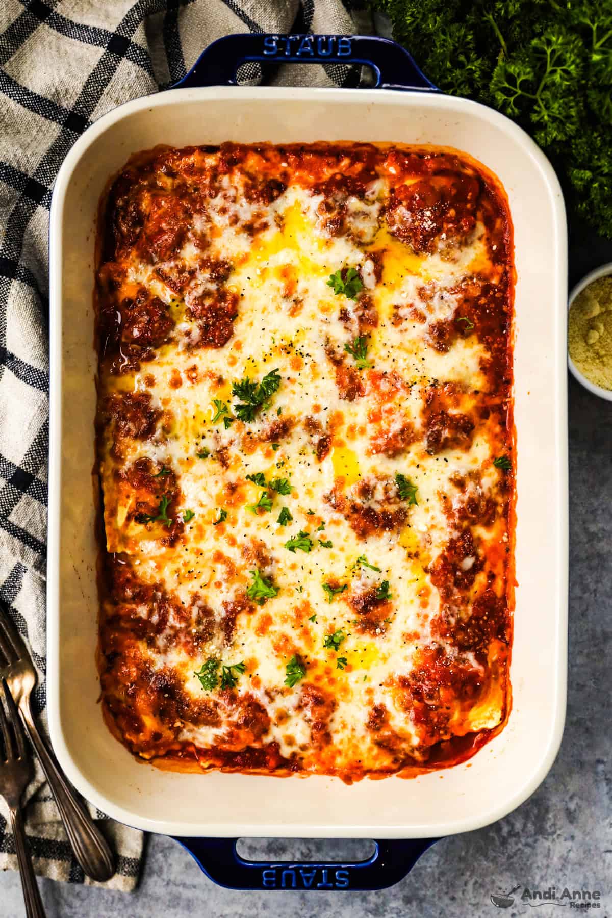 baked ravioli lasagna in a casserole dish