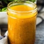 Classic vinaigrette salad dressing in a mason jar.