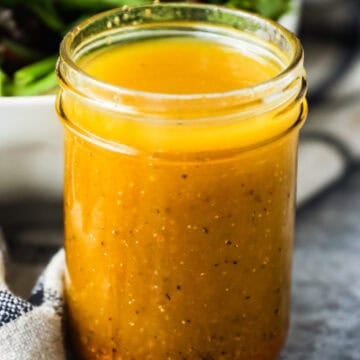 Classic vinaigrette salad dressing in a mason jar.
