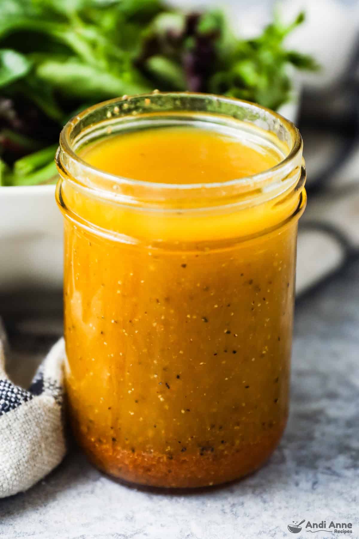 Classic vinaigrette salad dressing in a mason jar.