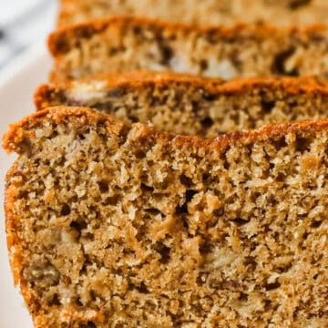 Slices of classic banana bread in a row.
