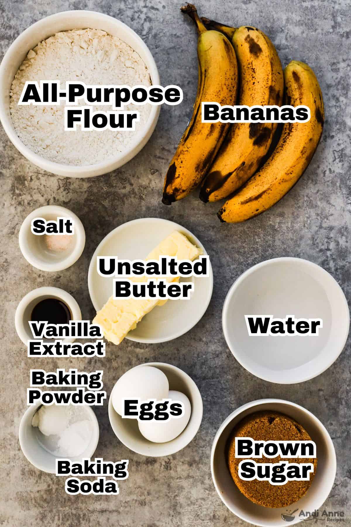 The ingredients needed to make classic banana bread are in small individual bowls.